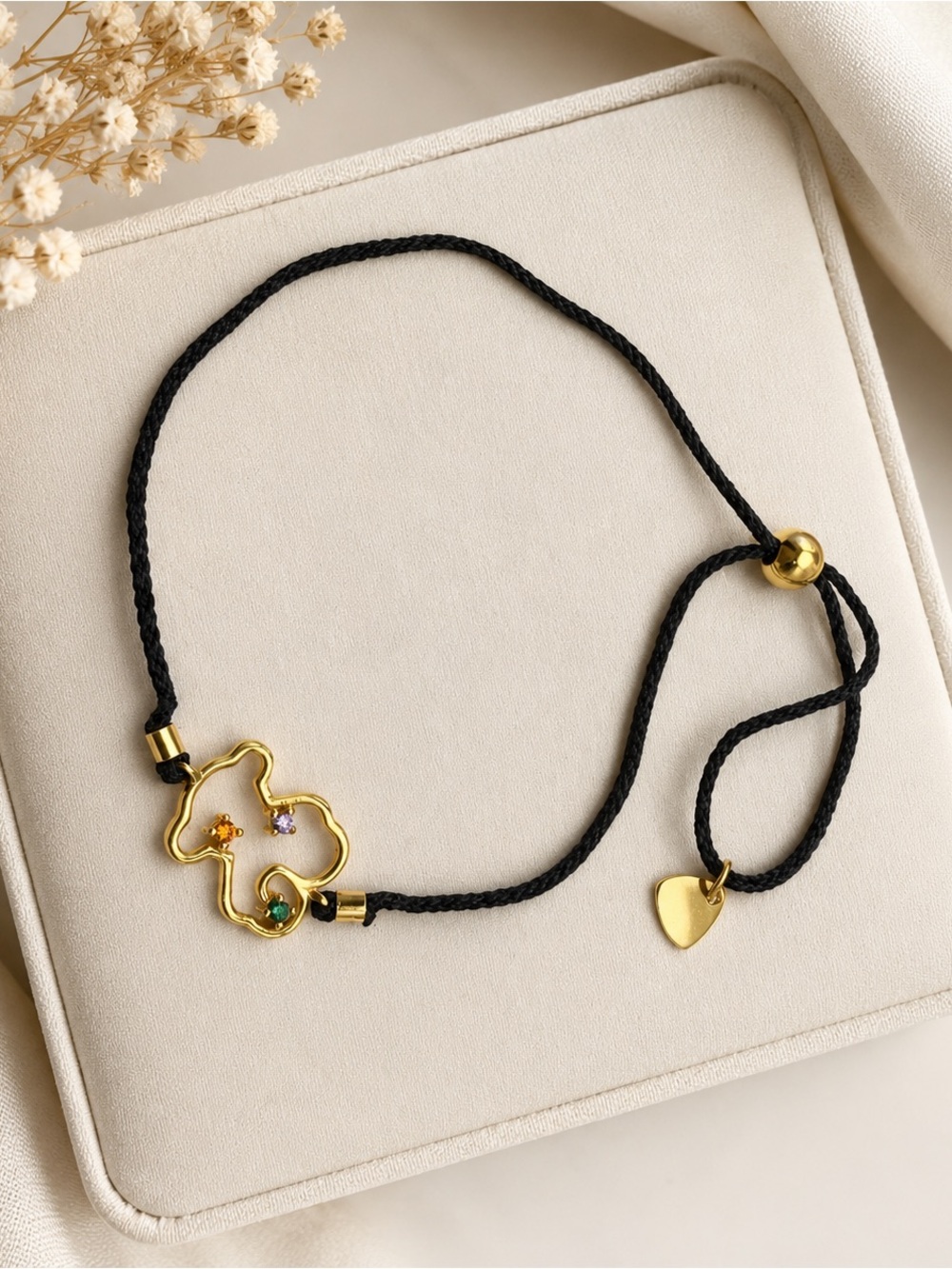 Elegant Gold and Black Bracelet